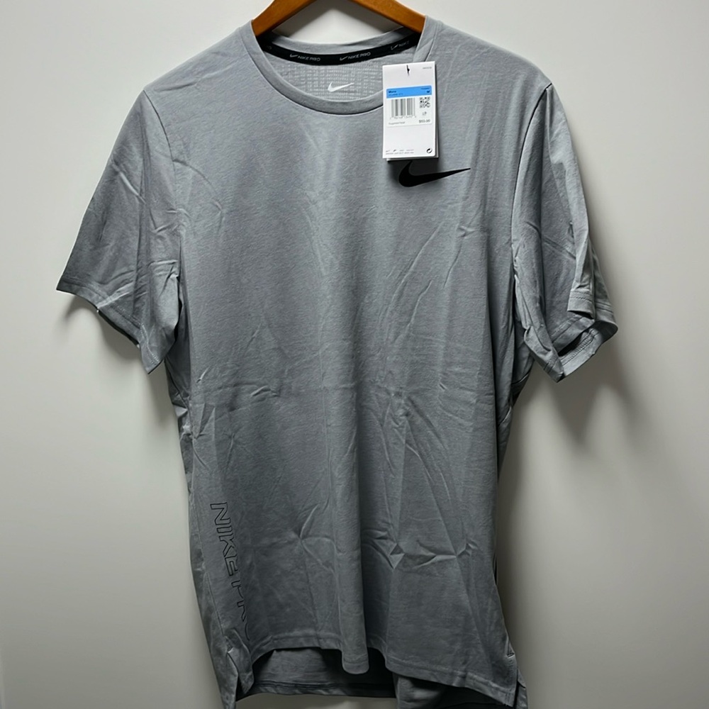 Nike pro Dri fit training T-shirt with design on back see pictures